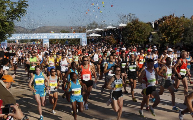 Athletes run during the start of the Athens' Marathon race in Marathon town, northeast of Athens