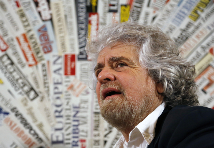 The 5-Star Movement leader and comedian Grillo looks on before a news conference for foreign press in downtown Rome