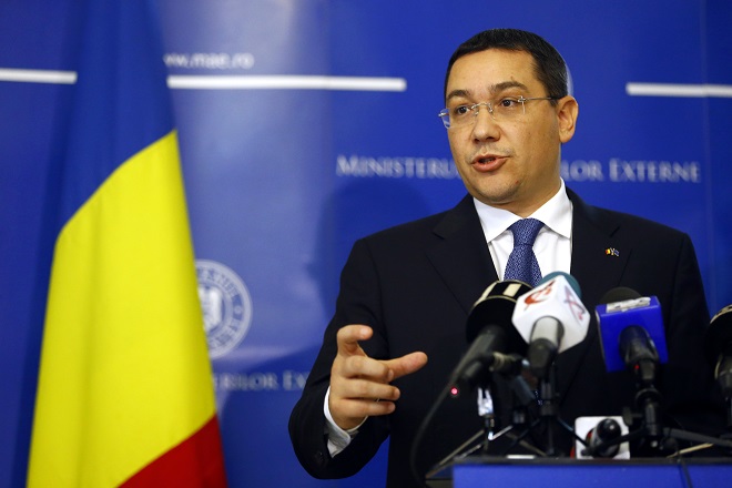 Romania's Prime Minister Ponta gestures during a news conference at the Foreign Ministry in Bucharest