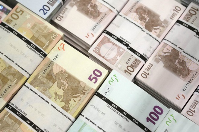 Wads of euro banknotes are pictured at the GSA company's headquarters in Vienna