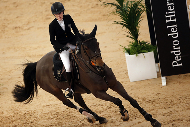 Marta Ortega, daughter of Amancio Ortega, founder and former chairman of Spanish global fashion group Inditex, competes during Madrid Horse Week in Madrid