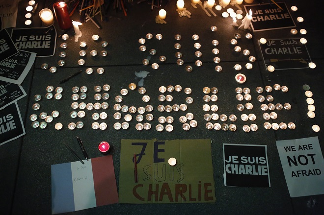 Makeshift memorial is seen outside the Consulate General of France during a vigil for the victims of an attack on satirical magazine Charlie Hebdo in Paris, in San Francisc