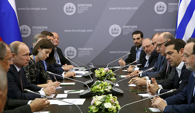 Russian President Vladimir Putin (2nd L) and Greek Prime Minister Alexis Tsipras (2nd R) attend a meeting at the St. Petersburg International Economic Forum 2015 (SPIEF 2015) in St. Petersburg, Russia, June 19, 2015. REUTERS/Grigory Dukor - RTX1H9OG