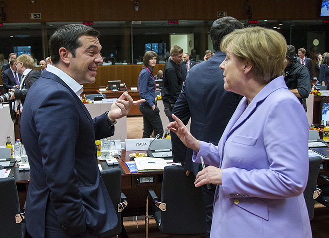 Greek Prime Minister Alexis Tsipras (L) talks with German Chancellor Angela Merkel at a European Union leaders summit in Brussels, Belgium, June 25, 2015.  REUTERS/Yves Herman   - RTR4YXAA