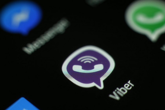 epa05269130 The logo of the messaging application Viber is pictured on a smartphone in Taipei, Taiwan, 21 April 2016. According to news reports Viber will be rolling out its end-to-end (E2E) encryption for its more than 700 million users. One of the most popular messaging application is owned by Japanese ecommerce Rakuten.  EPA/RITCHIE B. TONGO