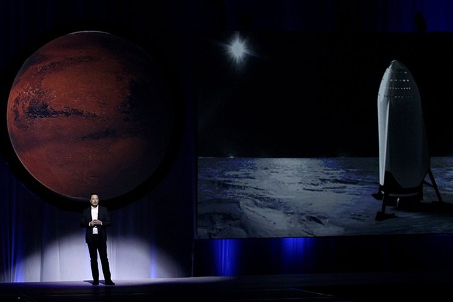 epaselect epa05559459 South African physicist, inventor, and SpaceX founder Elon Musk addresses the press during the 67th International Astronautics Congress in Guadalajara, Mexico, 27 September 2016. During the presentation, Musk outlined his plan to design spacecraft to aid in the human colonization of the planet Mars within 40 to 100 years.  EPA/ULISES RUIZ BASURTO