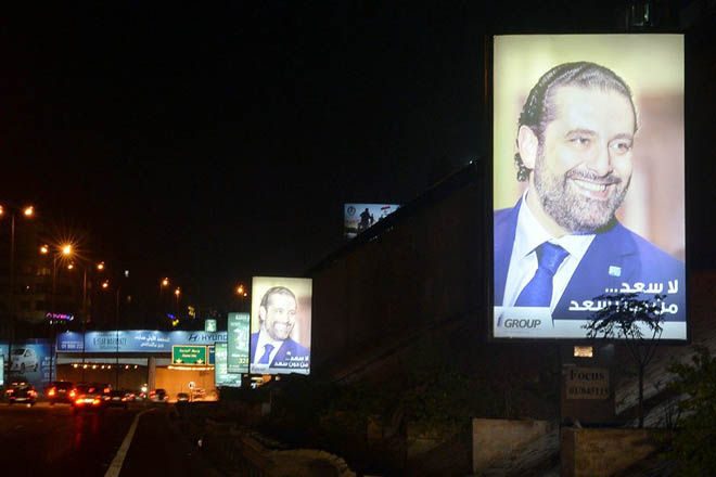 epa06337926 Posters depicting Saad Hariri, who has resigned as Lebanese Prime Minister, with Arabic words that read 'there is no happiness without Saad' are displayed on a street in Beirut, Lebanon, 18 November 2017. Hariri, who announced on 04 November his resignation and remained since then in the Saudi capital, has arrived in France on 18 November for his meeting with French President Emmanuel Macron at the Elysee Palace.  EPA/WAEL HAMZEH