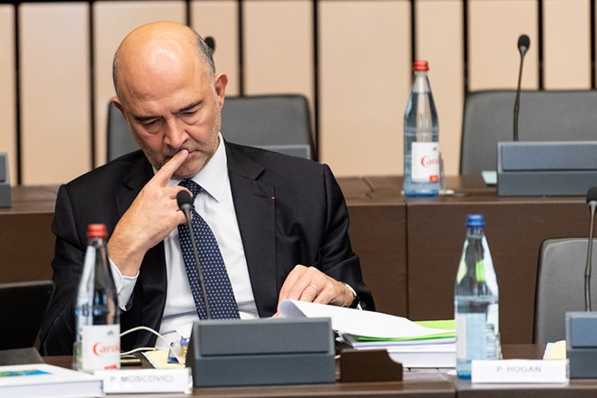 epa07113129 European Commissioner for Economic and Financial Affairs Pierre Moscovici reacts before the weekly meeting of the European Commission at the European Parliament in Strasbourg, France, 23 October 2018. The European Commission is discussing the controversial Italian budget plans for 2019. EPA/PATRICK SEEGER