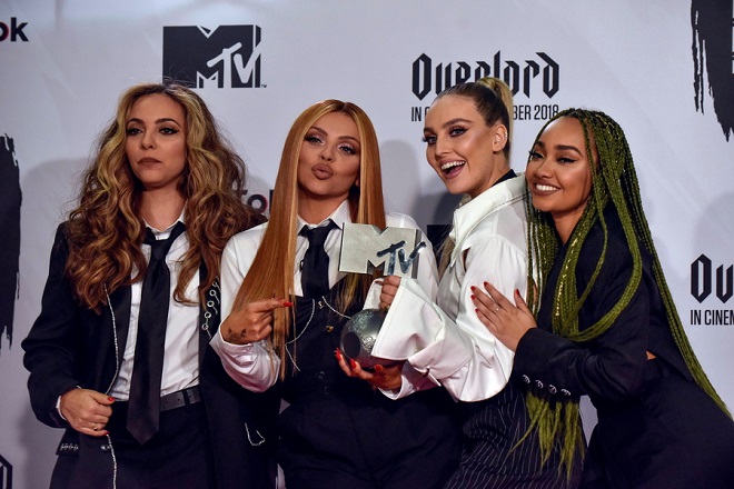 epa07141872 (L-R) Jade Thirlwall, Jesy Nelson, Leigh-Anne Pinnock and Perrie Edwards, members of British band Little Mix, pose for the photographers after receiving the Best Artist Award during the 2018 MTV Europe Music Awards at Bilbao Exhibition Centre, in Bilbao, Basque Country, Spain, 04 November 2018.  EPA/Miguel Tona