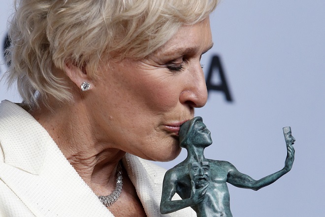 epaselect epa07326836 Glenn Close poses with the SAG Award for Outstanding performance by a Female Actor in a Leading Role in 'The Wife' during the 25th annual Screen Actors Guild Awards ceremony at the Shrine Auditorium in Los Angeles, California, USA, 27 January 2019.  EPA/NINA PROMMER