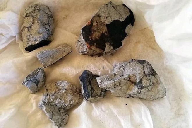 epa07337312 A handout photo made available by Cubadebate (Group of Cuban Journalists against Terrorism) shows rocks, fragments of alleged Meteorite that exploaded over Vinales, Cuba, 01 February 2019. According to reports, a strong explosion was observed in the sky over the Cuban province of Pinar del Rio (west) followed by falling rocks, which may be caused by an entry into the atmosphere of a meteorite.  EPA/CUBADEBATE HANDOUT BEST QUALITY AVAILABLE HANDOUT EDITORIAL USE ONLY/NO SALES