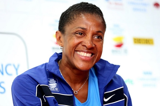 epa04749741 Former French sprinter Marie-Jose Perec, triple Olympic champion and International event ambassador of the TCS World 10K Bangalore, smiles during a press conference in Bangalore, India, 15 May 2015. Over 25,000 runners and 100 elite athletes will take part in the eighth edition of the TCS World 10K Bangalore.  EPA/JAGADEESH NV