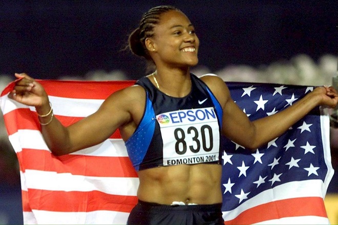 epa01219265 (FILE) A file photo of US Marion Jones celebrating after winning the women's 200m at the 8th World Athletics Championships in Edmonton, 10 August 2001. Disgraced Olympian Marion Jones was sentenced to six months in prison 11 January 2008 after admitting she lied about using steroids and taking part in a check-fraud scheme 2007.  EPA/ANJA NIEDRINGHAUS
