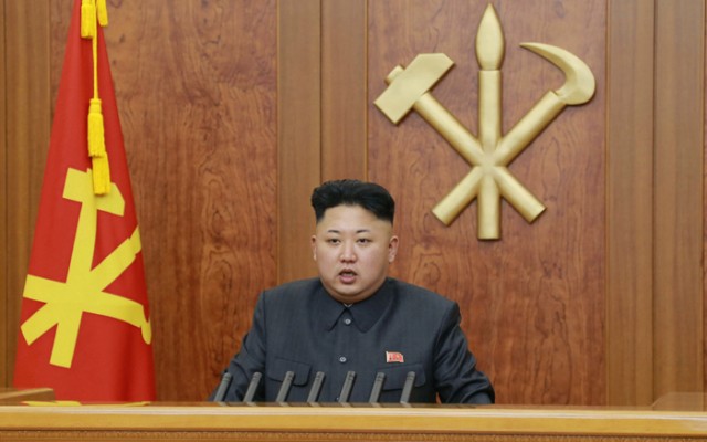 North Korean leader Kim delivers a speech during his New Year address in this undated photo released by Kyodo