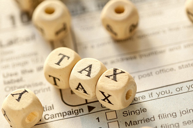 ΕΥ: Υψηλή φορολογία και η ασαφής φορολογική νομοθεσία, «μπλοκάρουν» ανάπτυξη και επενδύσεις