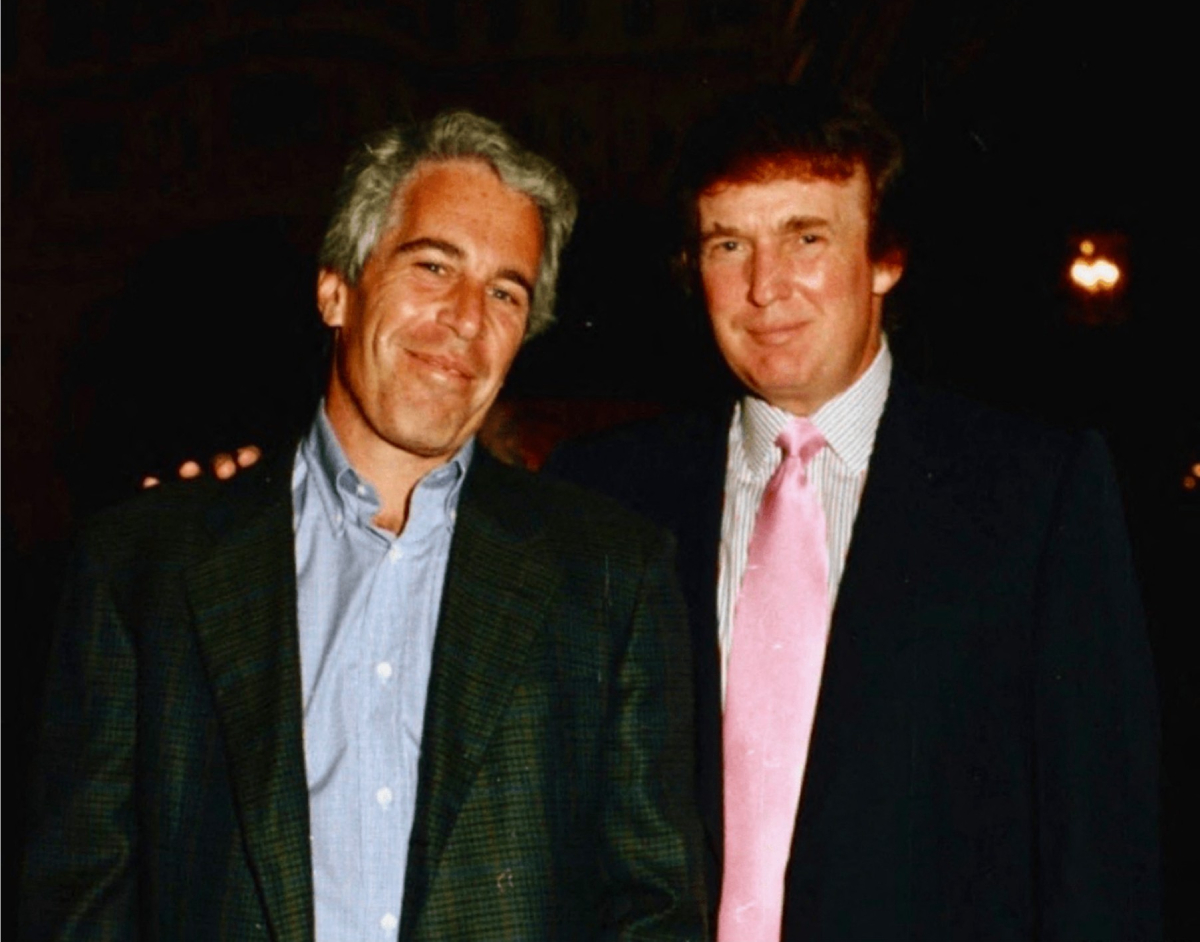 This undated photo released by the US Justice Department on January 30, 2026 as part of the Jeffrey Epstein files shows Jeffrey Epstein with Donald Trump in an unidentified location. US authorities on January 30, 2026, released the latest cache of files related to the investigation into the late convicted sex offender Jeffrey Epstein. The files contained references to numerous high-profile figures, including US President Donald Trump, Microsoft co-founder Bill Gates, Commerce Secretary Howard Lutnick and British billionaire Richard Branson. (Photo by HANDOUT / US Department of Justice / AFP) / RESTRICTED TO EDITORIAL USE - MANDATORY CREDIT "AFP PHOTO / US DEPARTMENT OF JUSTICE" - HANDOUT - NO MARKETING NO ADVERTISING CAMPAIGNS - DISTRIBUTED AS A SERVICE TO CLIENTS